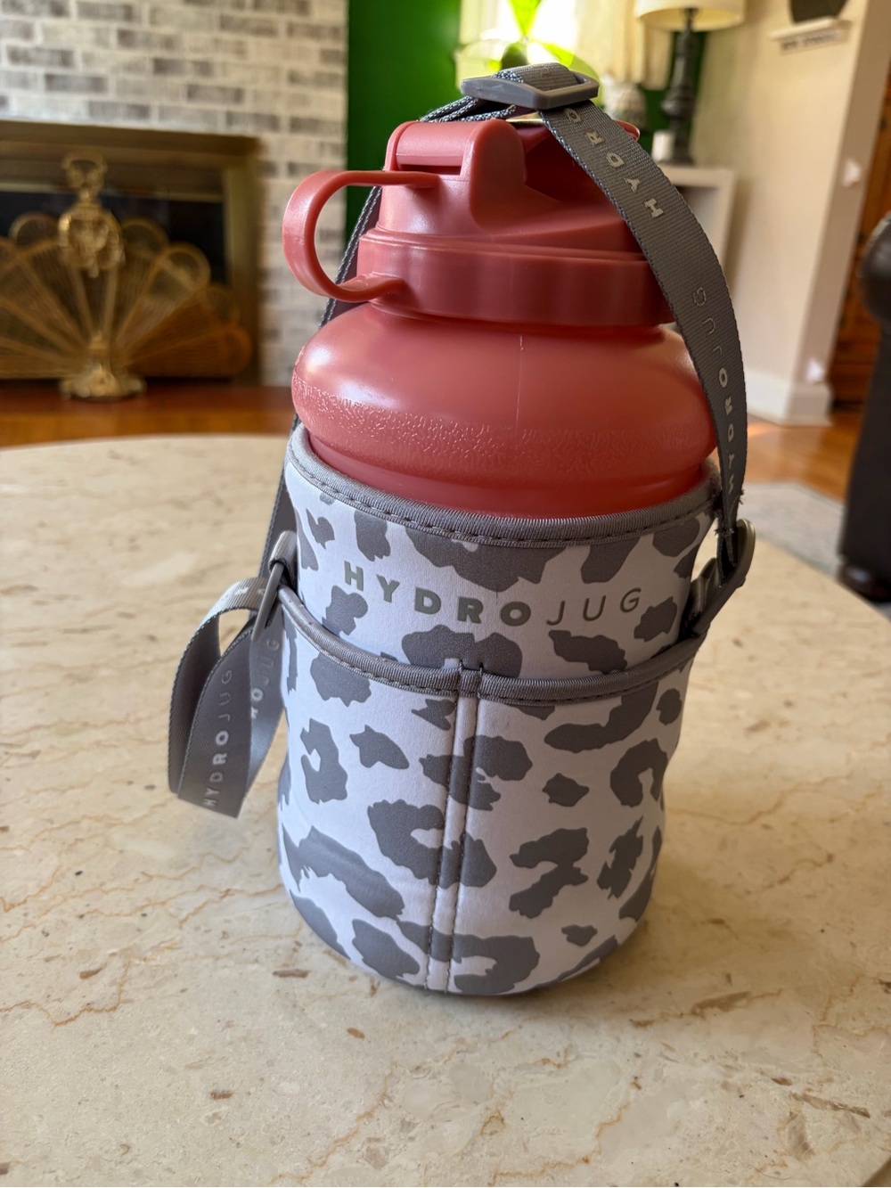 73 oz, (2.2 Liter)HydroJug pink water Bottle Carrier with Gray Leopard Sleeve